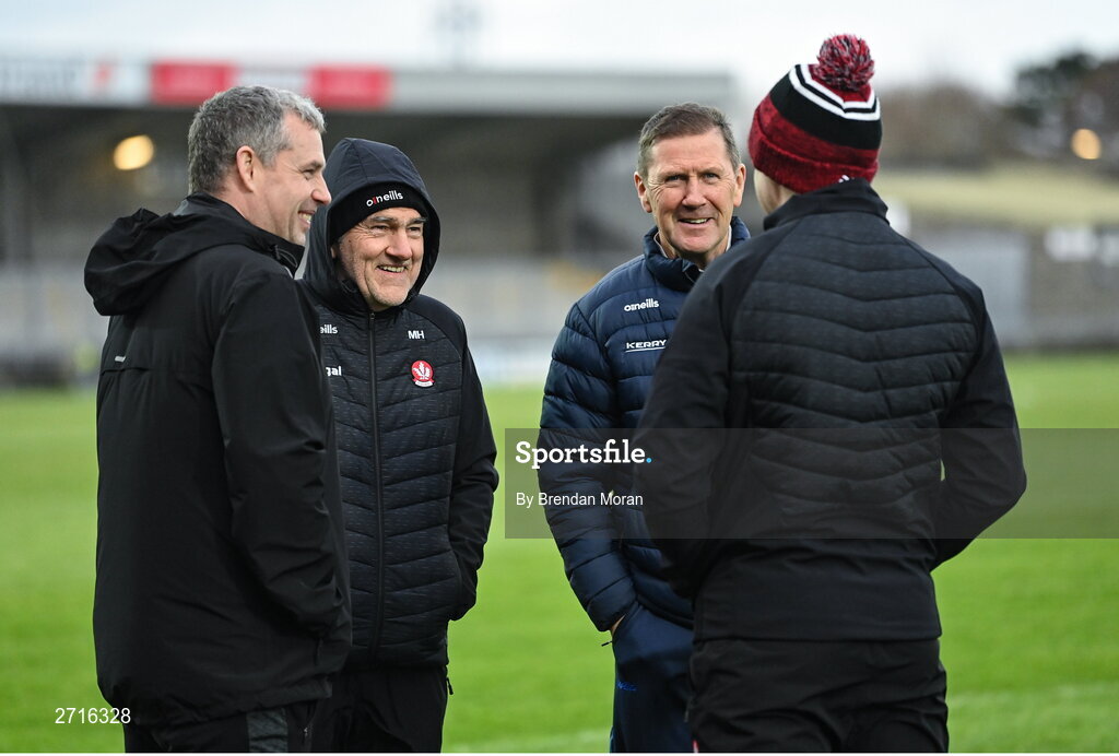 27 January 2024; Derry manager Mickey Harte, second from left, and Kerry manager Jack O'Connor, second from right, meet before the Allianz Football League Division 1 match between Kerry and Derry at Austin Stack Park in Tralee, Kerry. Photo by Brendan Moran/Sportsfile