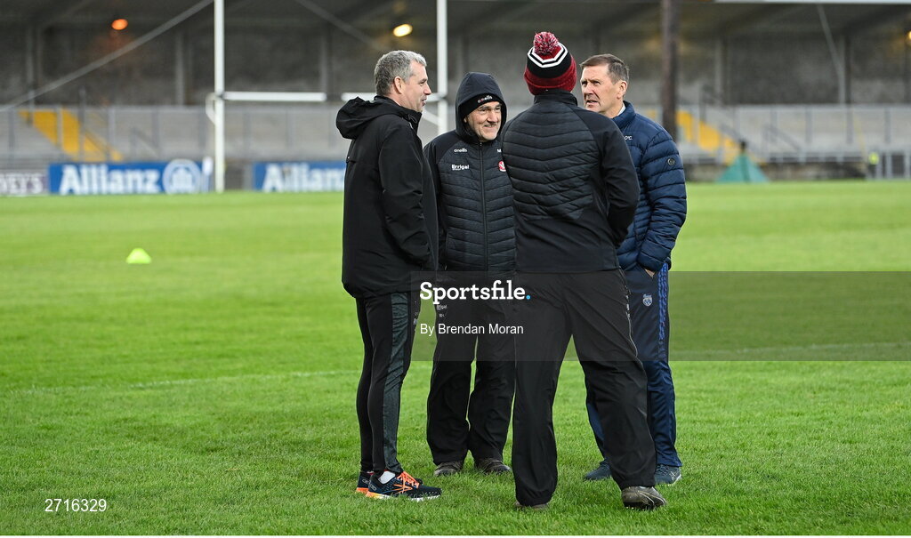 27 January 2024; Derry manager Mickey Harte, second from left, and Kerry manager Jack O'Connor, second from right, meet before the Allianz Football League Division 1 match between Kerry and Derry at Austin Stack Park in Tralee, Kerry. Photo by Brendan Moran/Sportsfile