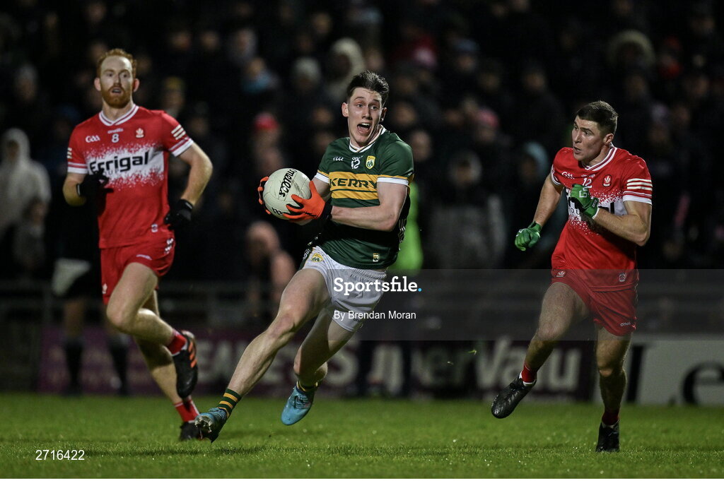 27 January 2024; Cillian Burke of Kerry in action against Ciaran McFaul of Derry during the Allianz Football League Division 1 match between Kerry and Derry at Austin Stack Park in Tralee, Kerry. Photo by Brendan Moran/Sportsfile
