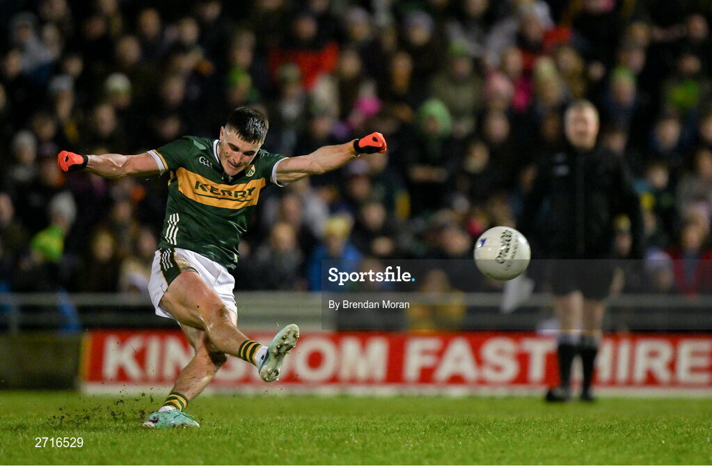 27 January 2024; Sean O'Shea of Kerry slips as he takes a free in the final minutes of the Allianz Football League Division 1 match between Kerry and Derry at Austin Stack Park in Tralee, Kerry. Photo by Brendan Moran/Sportsfile