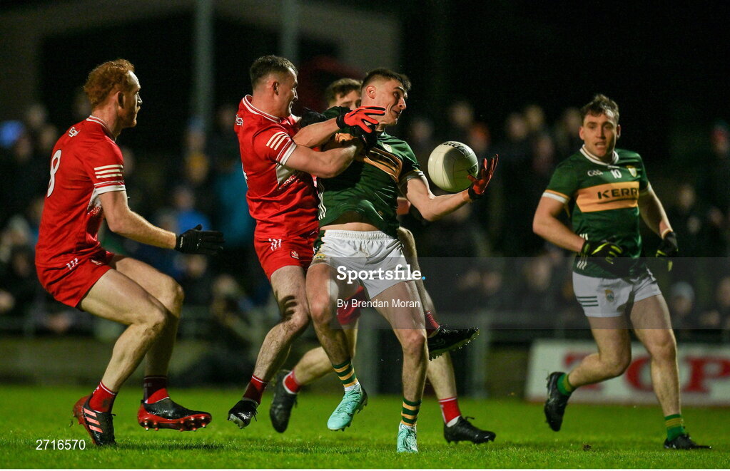 27 January 2024; Sean O'Shea of Kerry is tackled by Diarmuid Baker of Derry during the Allianz Football League Division 1 match between Kerry and Derry at Austin Stack Park in Tralee, Kerry. Photo by Brendan Moran/Sportsfile