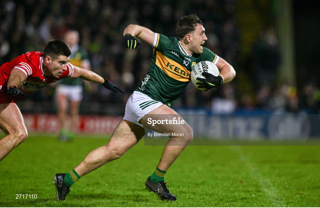 27 January 2024; Dara Moynihan of Kerry is tackled by Declan Cassidy of Derry during the Allianz Football League Division 1 match between Kerry and Derry at Austin Stack Park in Tralee, Kerry. Photo by Brendan Moran/Sportsfile