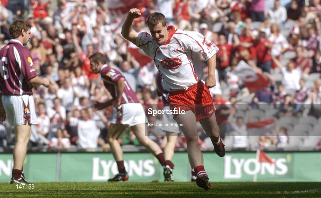 17 July 2004; Tyrone's Brian McGuigan celebrates after scoring his side's opening goal. Bank of Ireland Senior Football Championship Qualifier, Round 3, Tyrone v Galway, Croke Park, Dublin. Picture credit; Damien Eagers / SPORTSFILE