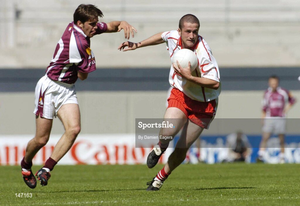 17 July 2004; Stephen O'Neill, Tyrone, in action against Matthew Clancy, Galway. Bank of Ireland Senior Football Championship Qualifier, Round 3, Tyrone v Galway, Croke Park, Dublin. Picture credit; Damien Eagers / SPORTSFILE