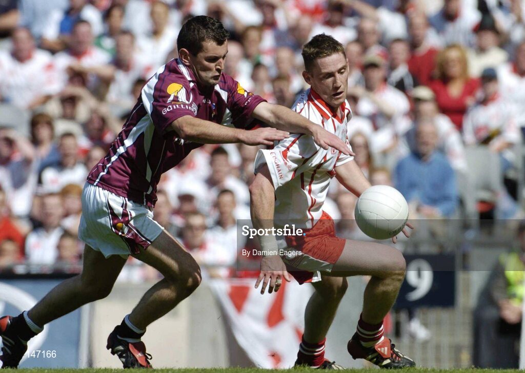 17 July 2004; Michael Coleman, Tyrone, in action against Tomas Meehan, Galway. Bank of Ireland Senior Football Championship Qualifier, Round 3, Tyrone v Galway, Croke Park, Dublin. Picture credit; Damien Eagers / SPORTSFILE