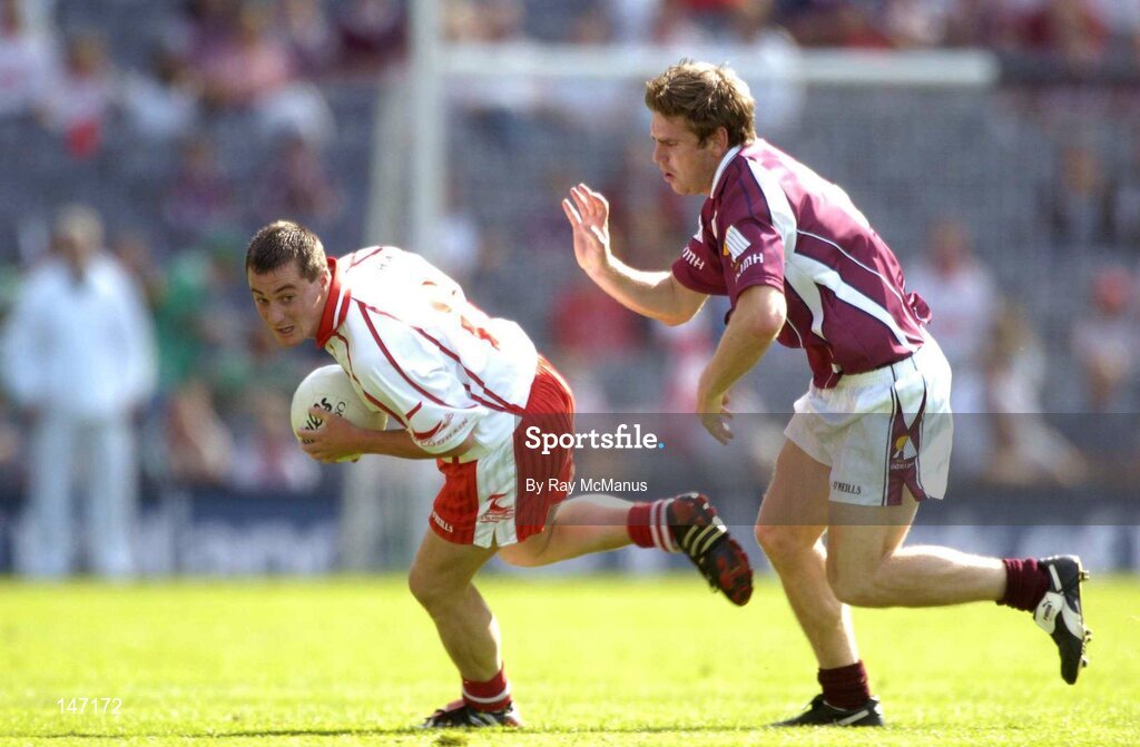 17 July 2004; Brian McGuigan, Tyrone, in action against Paul Clancy, Galway. Bank of Ireland Senior Football Championship Qualifier, Round 3, Tyrone v Galway, Croke Park, Dublin. Picture credit; Ray McManus / SPORTSFILE