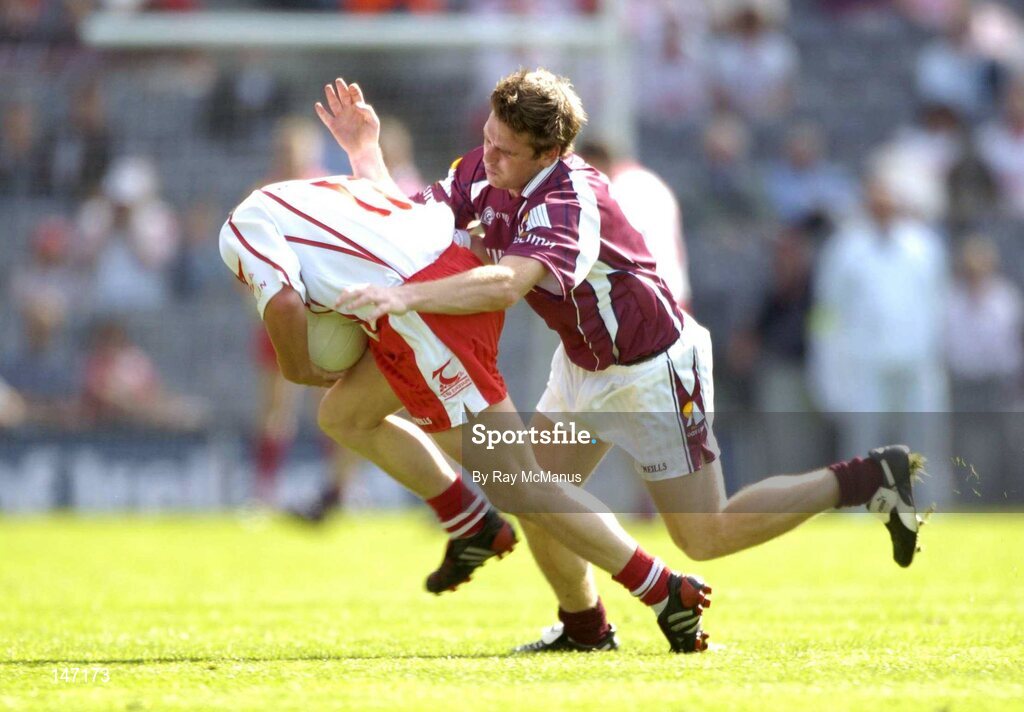 17 July 2004; Brian McGuigan, Tyrone, in action against Paul Clancy, Galway. Bank of Ireland Senior Football Championship Qualifier, Round 3, Tyrone v Galway, Croke Park, Dublin. Picture credit; Ray McManus / SPORTSFILE
