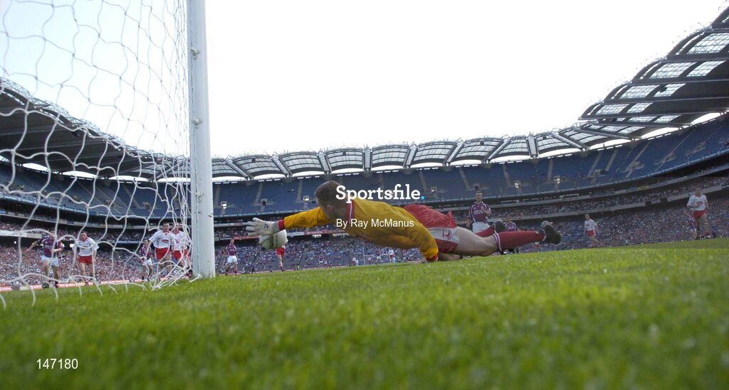 17 July 2004; The Tyrone goalkeeper Pascal McDonnell dives to his left to save a penalty kick from Derek Savage, Galway. Bank of Ireland Senior Football Championship Qualifier, Round 3, Tyrone v Galway, Croke Park, Dublin. Picture credit; Ray McManus / SPORTSFILE