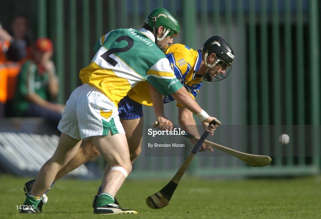 17 July 2004; Tony Carmody, Clare, in action against Barry Teehan, Offaly. Guinness Senior Hurling Championship Qualifier, Round 3, Clare v Offaly, Gaelic Grounds, Limerick. Picture credit; Brendan Moran / SPORTSFILE