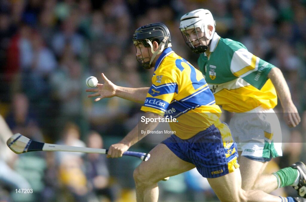 17 July 2004; David Forde, Clare, in action against Kevin Brady, Offaly. Guinness Senior Hurling Championship Qualifier, Round 3, Clare v Offaly, Gaelic Grounds, Limerick. Picture credit; Brendan Moran / SPORTSFILE