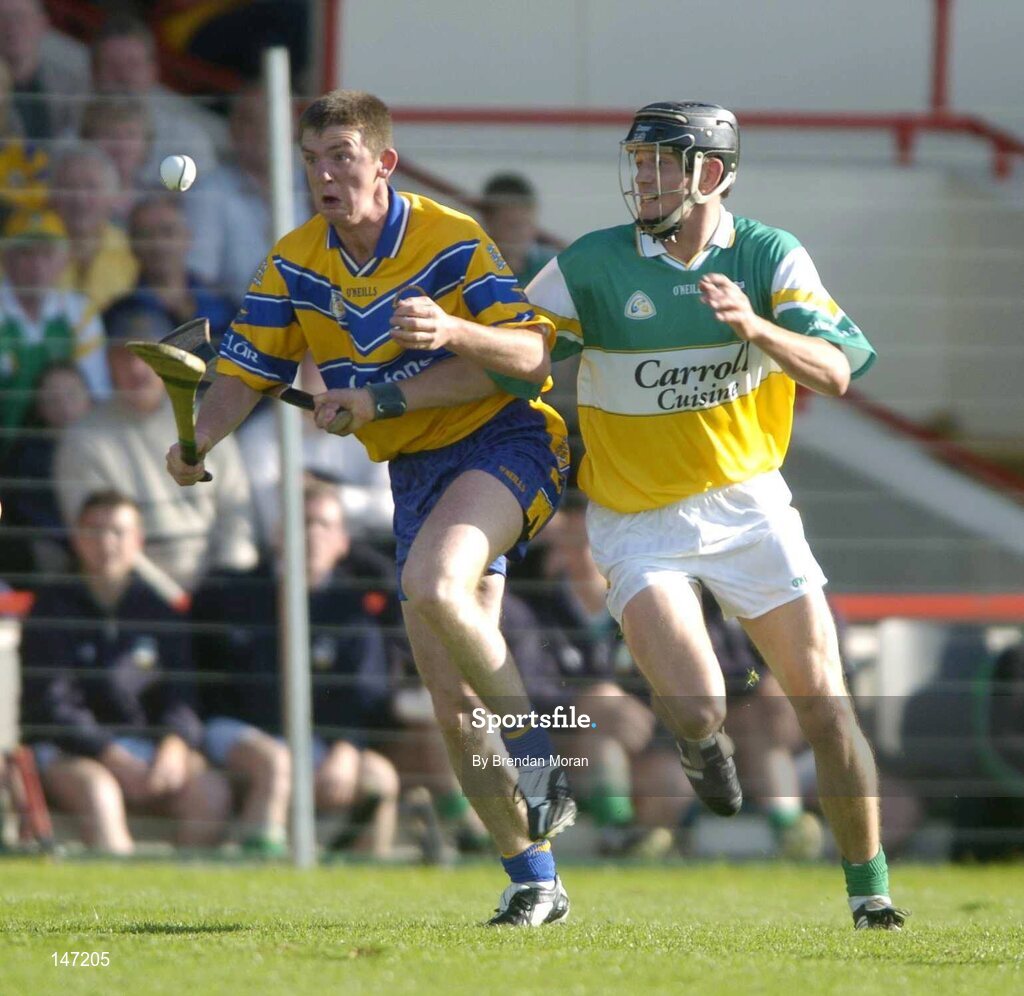 17 July 2004; Diarmuid McMahon, Clare, in action against Rory Hanniffy, Offaly. Guinness Senior Hurling Championship Qualifier, Round 3, Clare v Offaly, Gaelic Grounds, Limerick. Picture credit; Brendan Moran / SPORTSFILE