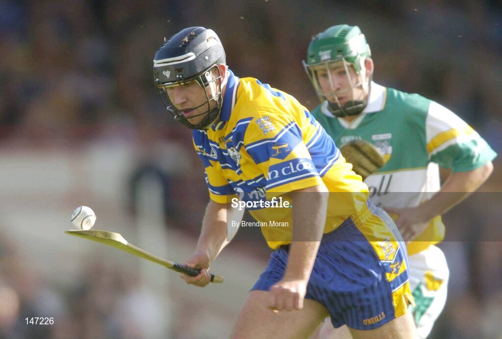 17 July 2004; Tony Carmody, Clare, in action against Barry Teehan, Offaly. Guinness Senior Hurling Championship Qualifier, Round 3, Clare v Offaly, Gaelic Grounds, Limerick. Picture credit; Brendan Moran / SPORTSFILE