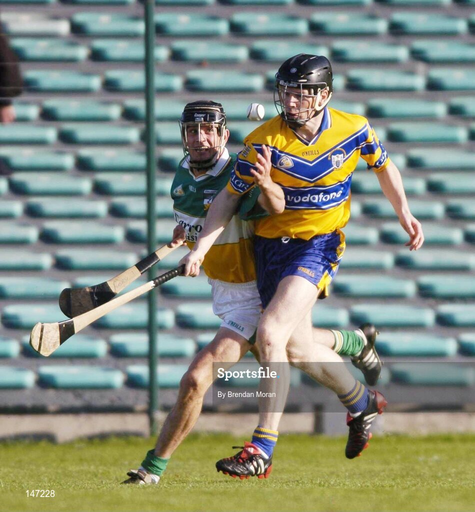 17 July 2004; Rory Hanniffy, Offaly, in action against Frank Lohan, Clare. Guinness Senior Hurling Championship Qualifier, Round 3, Clare v Offaly, Gaelic Grounds, Limerick. Picture credit; Brendan Moran / SPORTSFILE