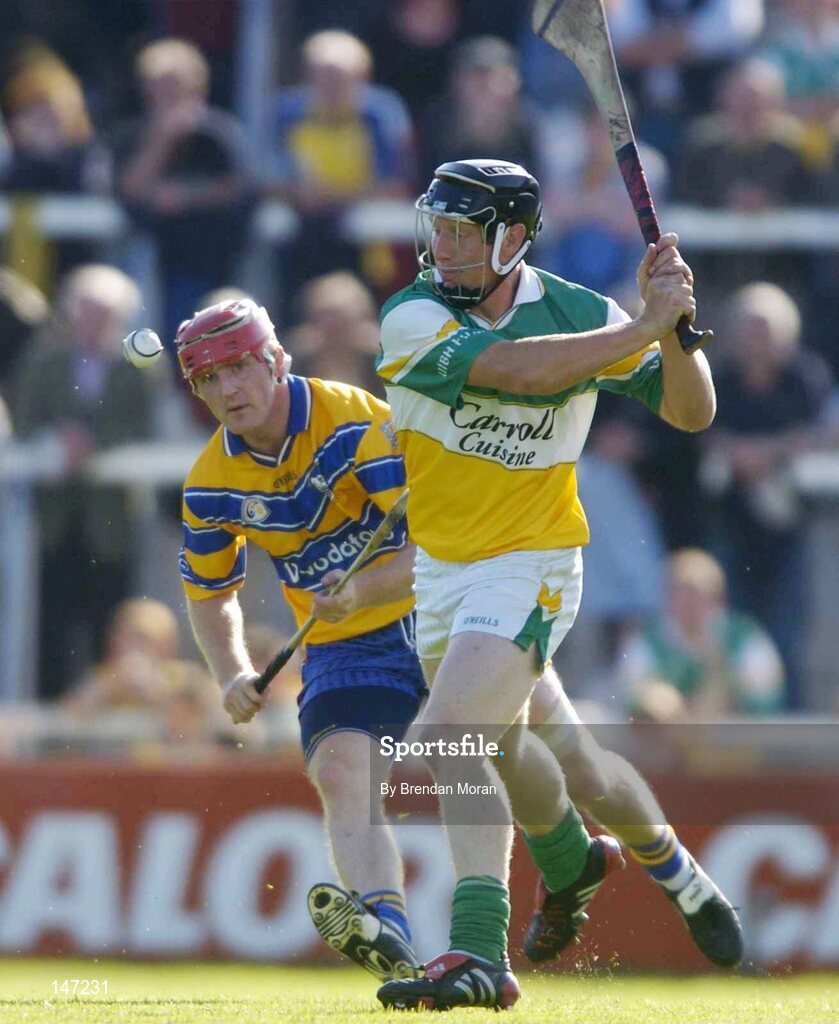 17 July 2004; Neville Coughlan, Offaly, in action against Brian Lohan, Clare. Guinness Senior Hurling Championship Qualifier, Round 3, Clare v Offaly, Gaelic Grounds, Limerick. Picture credit; Brendan Moran / SPORTSFILE
