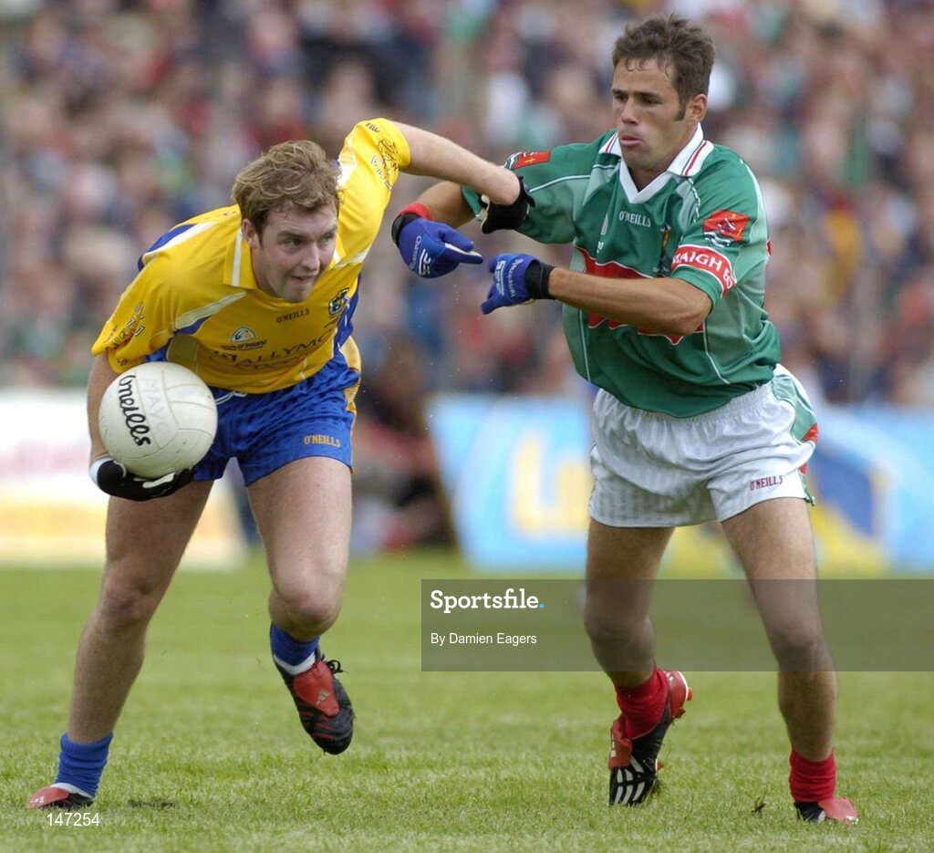 18 July 2004; David Casey, Roscommon, in action against James Gill, Mayo. Bank of Ireland Connacht Senior Football Championship Final, Mayo v Roscommon, McHale Park, Castlebar, Co. Mayo. Picture credit; Damien Eagers / SPORTSFILE