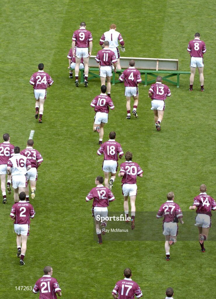 18 July 2004; Members of the Westmeath squad make their way to the bench for the traditional team photograph before the Bank of Ireland Leinster Senior Football Championship Final match between Laois and Westmeath at Croke Park in Dublin. Photo by Ray McManus/Sportsfile
