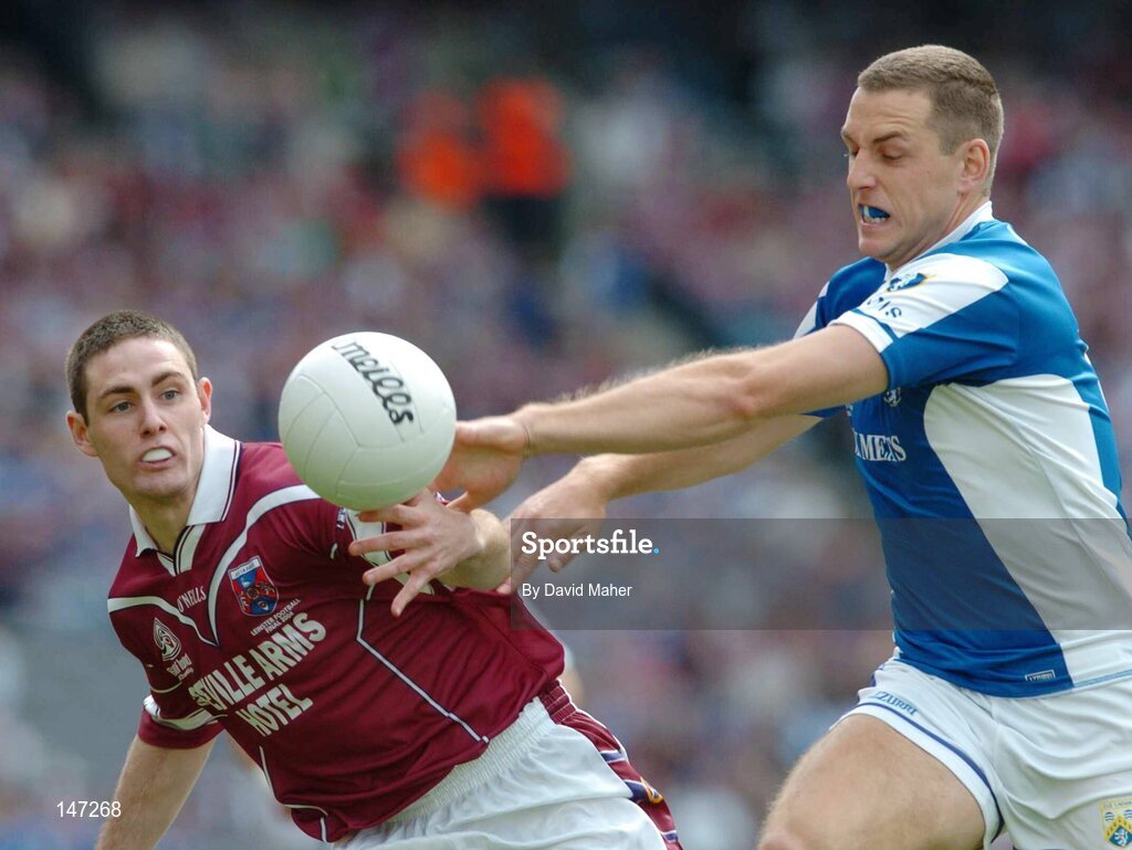 18 July 2004; Fergal Wilson, Westmeath, in action against Darren Rooney, Laois. Bank of Ireland Leinster Senior Football Championship Final, Laois v Westmeath, Croke Park, Dublin. Picture credit; David Maher / SPORTSFILE