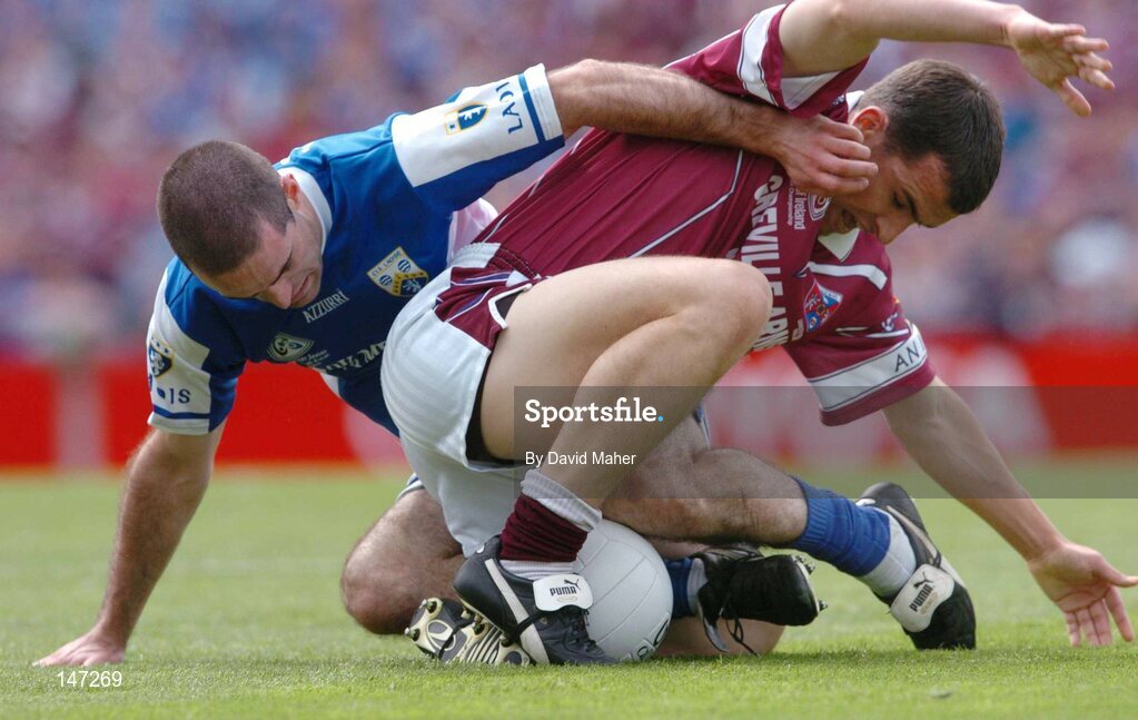 18 July 2004; Dessie Dolan, Westmeath, in action against Aidan Fennelly, Laois. Bank of Ireland Leinster Senior Football Championship Final, Laois v Westmeath, Croke Park, Dublin. Picture credit; David Maher / SPORTSFILE