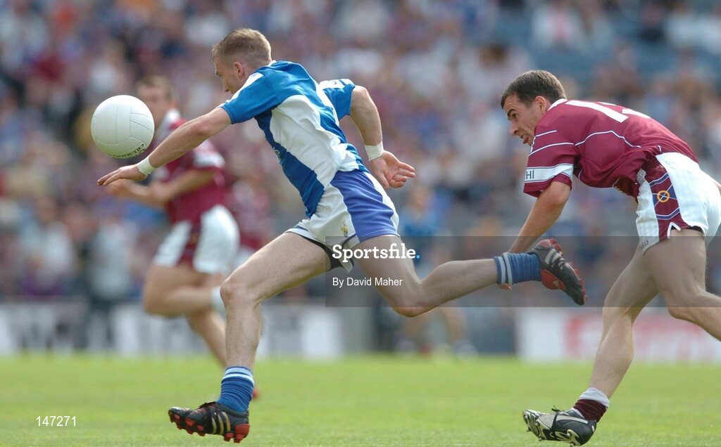 18 July 2004; Joe Higgins, Laois, in action against Dessie Dolan, Westmeath. Bank of Ireland Leinster Senior Football Championship Final, Laois v Westmeath, Croke Park, Dublin. Picture credit; David Maher / SPORTSFILE