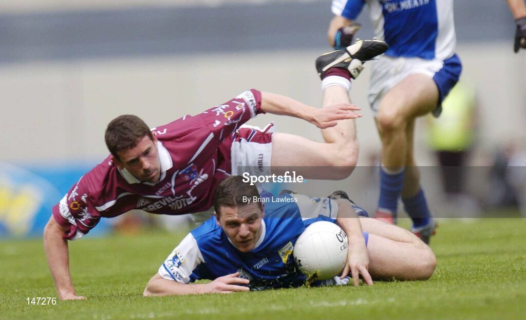 18 July 2004; Ian Fitzgerald, Laois, in action against James Davitt, Westmeath. Bank of Ireland Leinster Senior Football Championship Final, Laois v Westmeath, Croke Park, Dublin. Picture credit; Brian Lawless / SPORTSFILE