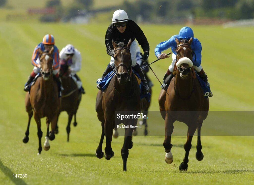 18 July 2004; Ouija Board, center, with Kieran Fallon up, on their way to winning the Darley Irish Oaks from second place Punctilious, right, with Frankie Dettori. Also in picture is All Too Beautiful, extreme left, with Jamie Spencer. Curragh Racecourse, Co. Kildare. Picture credit; Matt Browne / SPORTSFILE