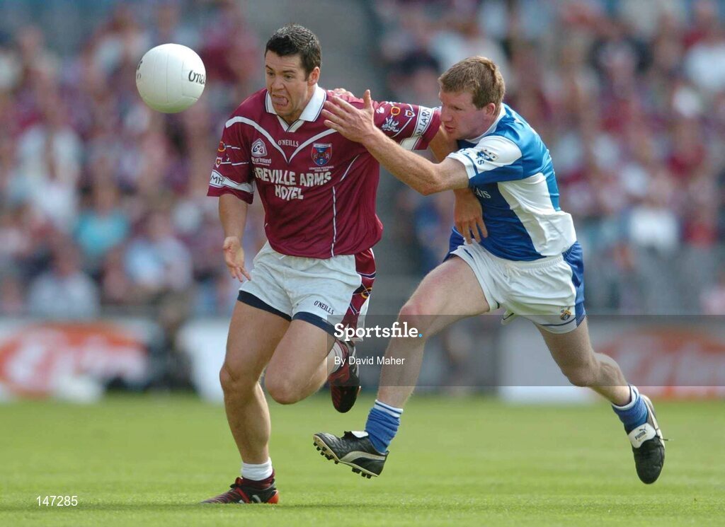 18 July 2004; Brian Morley, Westmeath, in action against Paul McDonald, Laois. Bank of Ireland Leinster Senior Football Championship Final, Laois v Westmeath, Croke Park, Dublin. Picture credit; David Maher / SPORTSFILE