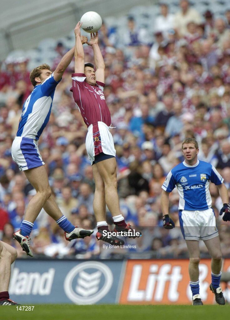 18 July 2004; Brian Morley, Westmeath, in action against Noel Garvan, Laois. Bank of Ireland Leinster Senior Football Championship Final, Laois v Westmeath, Croke Park, Dublin. Picture credit; Brian Lawless / SPORTSFILE