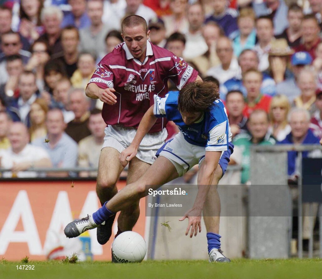 18 July 2004; Colm Parkinson, Laois, in action against John Keane, Westmeath. Bank of Ireland Leinster Senior Football Championship Final, Laois v Westmeath, Croke Park, Dublin. Picture credit; Brian Lawless / SPORTSFILE