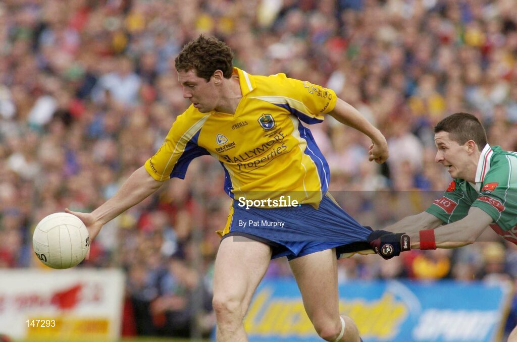 18 July 2004; Stephen Lohan, Roscommon, in action against Peadar Gardiner, Mayo. Bank of Ireland Connacht Senior Football Championship Final, Mayo v Roscommon, McHale Park, Castlebar, Co. Mayo. Picture credit; Pat Murphy / SPORTSFILE