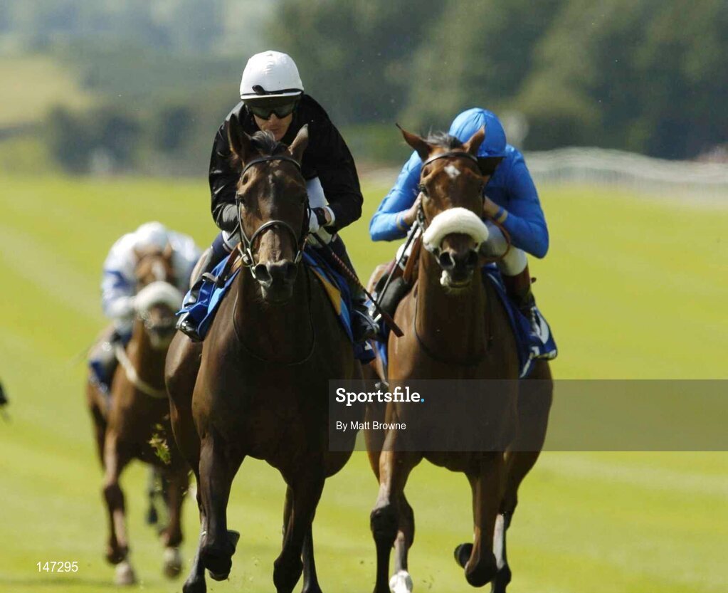 18 July 2004; Ouija Board, center, with Kieran Fallon up, on their way to winning the Darley Irish Oaks from second place Punctilious, right, with Frankie Dettori. Curragh Racecourse, Co. Kildare. Picture credit; Matt Browne / SPORTSFILE