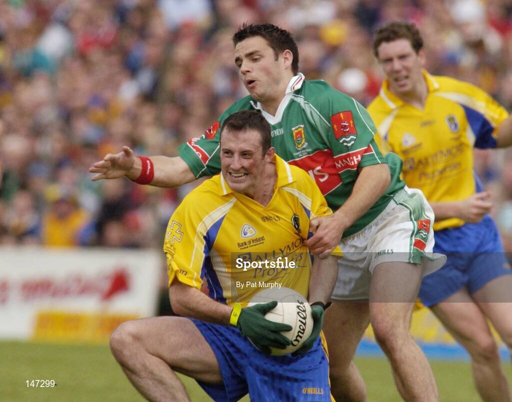 18 July 2004; Andy McPadden, Roscommon, in action against Brian Maloney, Mayo. Bank of Ireland Connacht Senior Football Championship Final, Mayo v Roscommon, McHale Park, Castlebar, Co. Mayo. Picture credit; Pat Murphy / SPORTSFILE