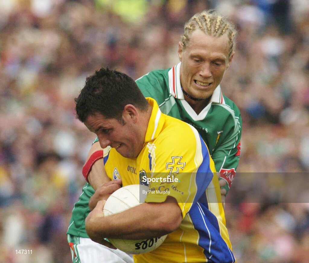 18 July 2004; Francie Grehan, Roscommon, in action against Ciaran McDonald, Mayo. Bank of Ireland Connacht Senior Football Championship Final, Mayo v Roscommon, McHale Park, Castlebar, Co. Mayo. Picture credit; Pat Murphy / SPORTSFILE