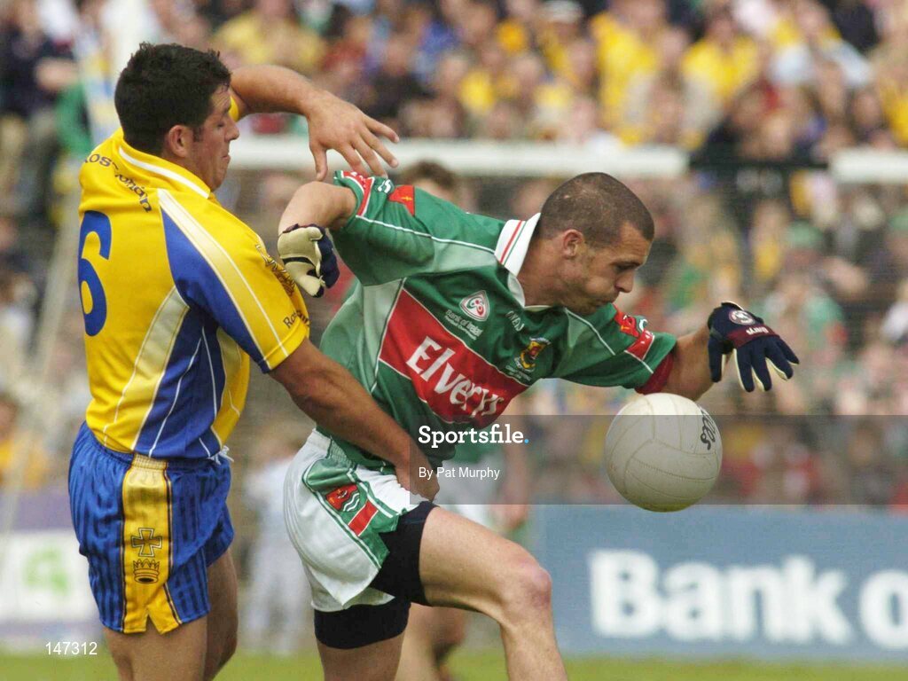 18 July 2004; Trevor Mortimer, Mayo, in action against Francie Grehan, Roscommon. Bank of Ireland Connacht Senior Football Championship Final, Mayo v Roscommon, McHale Park, Castlebar, Co. Mayo. Picture credit; Pat Murphy / SPORTSFILE