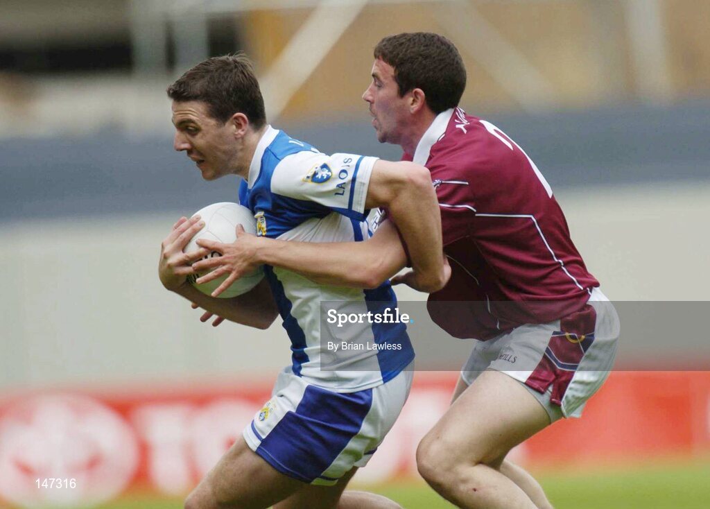 18 July 2004; Ian Fitzgerald, Laois, in action against James Davitt, Westmeath. Bank of Ireland Leinster Senior Football Championship Final, Laois v Westmeath, Croke Park, Dublin. Picture credit; Brian Lawless / SPORTSFILE