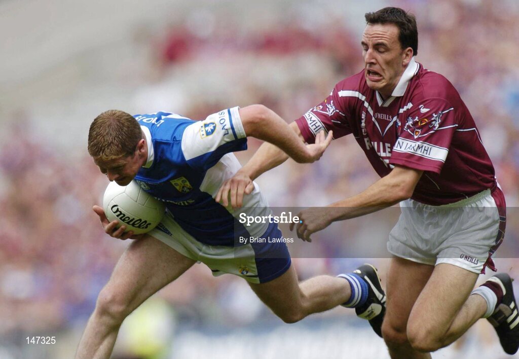 18 July 2004; Brian McDonald, Laois, in action against Damien Healy, Westmeath. Bank of Ireland Leinster Senior Football Championship Final, Laois v Westmeath, Croke Park, Dublin. Picture credit; Brian Lawless / SPORTSFILE