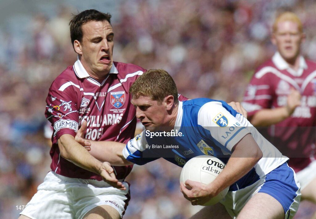 18 July 2004; Brian McDonald, Laois, in action against Damien Healy, Westmeath. Bank of Ireland Leinster Senior Football Championship Final, Laois v Westmeath, Croke Park, Dublin. Picture credit; Brian Lawless / SPORTSFILE