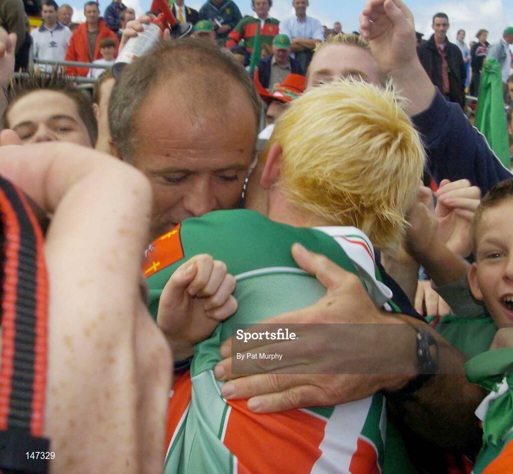 18 July 2004; Mayo manager John Maughan celebrates with Conor Mortimer after victory over Roscommon. Bank of Ireland Connacht Senior Football Championship Final, Mayo v Roscommon, McHale Park, Castlebar, Co. Mayo. Picture credit; Pat Murphy / SPORTSFILE