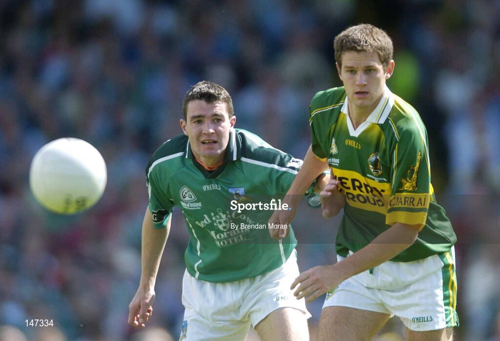 18 July 2004; Eoin Brosnan, Kerry, in action against Stephen Lucey, Limerick. Bank of Ireland Munster Senior Football Championship Final Replay, Kerry v Limerick, Fitzgerald Stadium, Killarney, Co. Kerry. Picture credit; Brendan Moran / SPORTSFILE