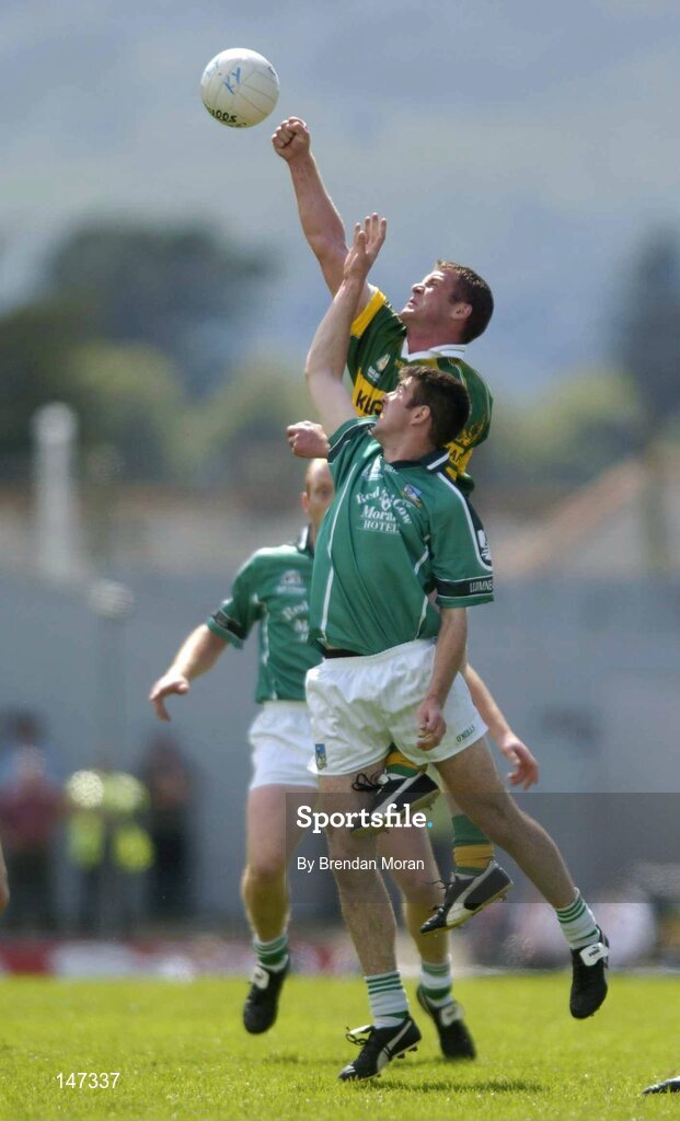 18 July 2004; Dara O'Cinneide, Kerry, in action against Conor Mullane, Limerick. Bank of Ireland Munster Senior Football Championship Final Replay, Kerry v Limerick, Fitzgerald Stadium, Killarney, Co. Kerry. Picture credit; Brendan Moran / SPORTSFILE