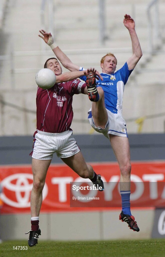 18 July 2004; David O'Shaughnessy, Westmeath, in action against Padraig Clancy, Laois. Bank of Ireland Leinster Senior Football Championship Final, Laois v Westmeath, Croke Park, Dublin. Picture credit; Brian Lawless / SPORTSFILE