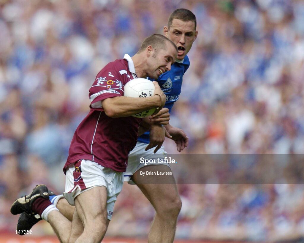18 July 2004; Paul Conway, Westmeath, in action against Darren Rooney, Laois. Bank of Ireland Leinster Senior Football Championship Final, Laois v Westmeath, Croke Park, Dublin. Picture credit; Brian Lawless / SPORTSFILE