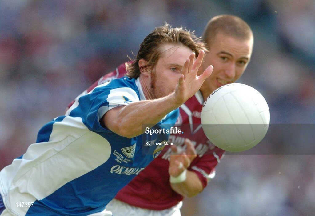 18 July 2004; Colm Parkinson, Laois, in action against John Keane, Westmeath. Bank of Ireland Leinster Senior Football Championship Final, Laois v Westmeath, Croke Park, Dublin. Picture credit; David Maher / SPORTSFILE