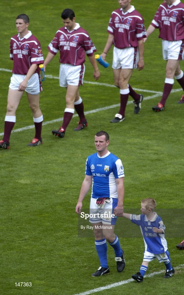 18 July 2004; The Laois full-back Colm Byrne and his son Cian during the parade. Bank of Ireland Leinster Senior Football Championship Final, Laois v Westmeath, Croke Park, Dublin. Picture credit; Ray McManus / SPORTSFILE