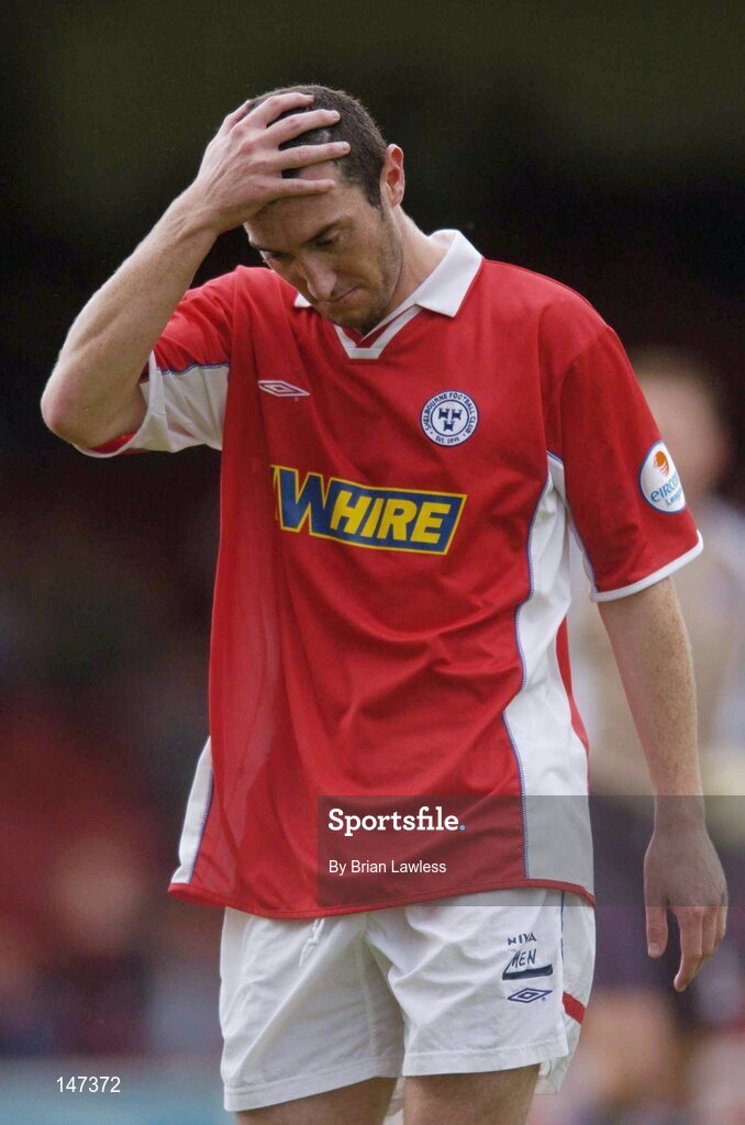 18 July 2004; Jason Byrne, Shelbourne, leaves the pitch having been sent off. eircom league, Premier Division, Shelbourne v Drogheda United, Tolka Park, Dublin. Picture credit; Brian Lawless / SPORTSFILE