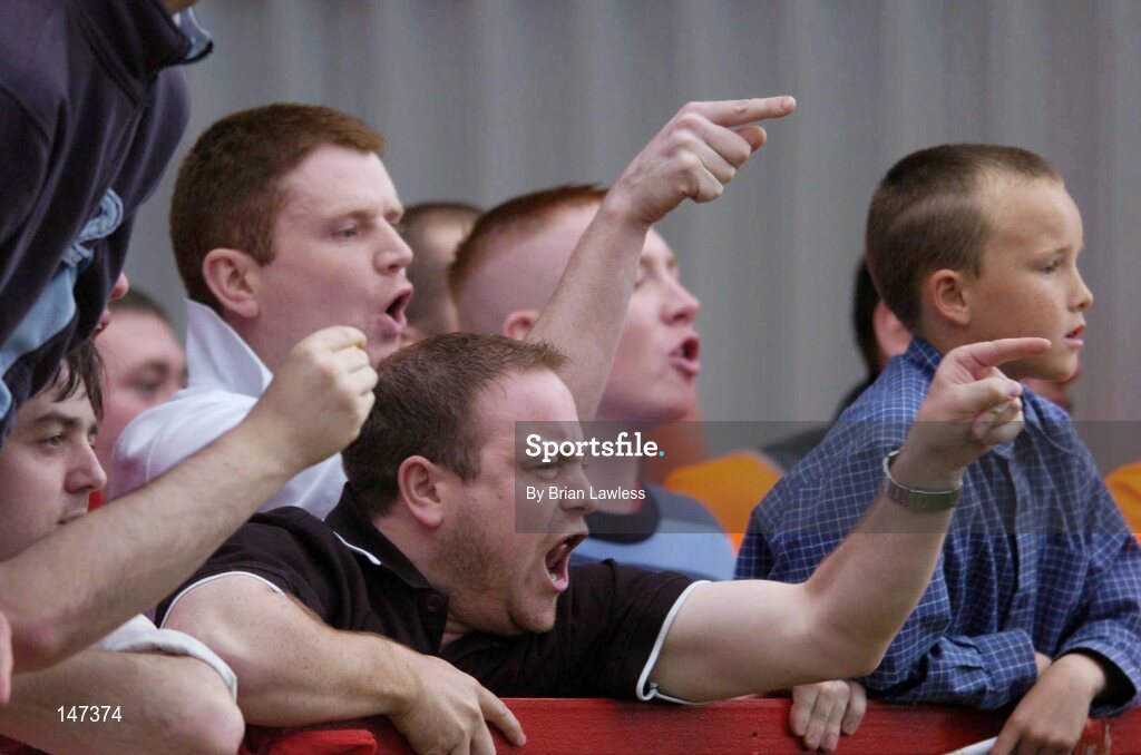 18 July 2004; Shelbourne fans shout in the direction of the referee as he leaves the pitch at half time. eircom league, Premier Division, Shelbourne v Drogheda United, Tolka Park, Dublin. Picture credit; Brian Lawless / SPORTSFILE