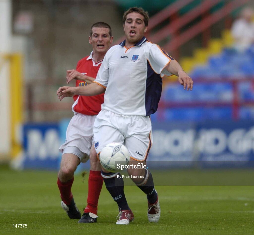 18 July 2004; John Lestor, Drogheda United, in action against Jim Crawford, Shelbourne. eircom league, Premier Division, Shelbourne v Drogheda United, Tolka Park, Dublin. Picture credit; Brian Lawless / SPORTSFILE