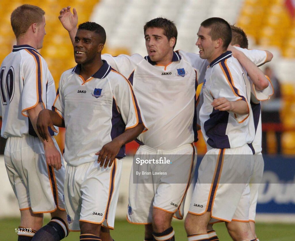 18 July 2004; Drogheda United players, from left to right, Mark Rooney, Jermaine Sandvliet, John Lestor, Gavin Whelan and Gary Cronin (hidden) celebrate after Cronin scored Drogheda's second goal. eircom league, Premier Division, Shelbourne v Drogheda United, Tolka Park, Dublin. Picture credit; Brian Lawless / SPORTSFILE