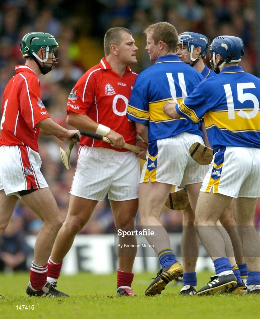 10 July 2004; Diarmuid O'Sullivan, Cork, and Conor Gleeson, Tipperary, square up to each other during the game. Guinness Senior Hurling Championship Qualifier, Round 3, Cork v Tipperary, Fitzgerald Stadium, Killarney, Co. Kerry. Picture credit; Brendan Moran / SPORTSFILE