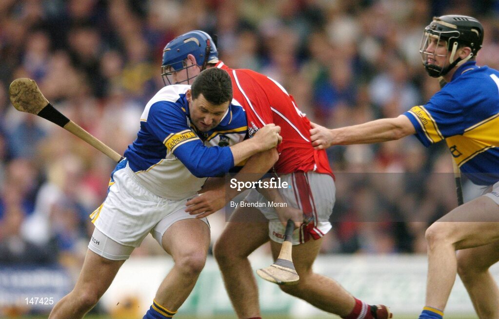 10 July 2004; Brendan Cummins, Tipperary, in action against Kieran Murphy, Cork. Guinness Senior Hurling Championship Qualifier, Round 3, Cork v Tipperary, Fitzgerald Stadium, Killarney, Co. Kerry. Picture credit; Brendan Moran / SPORTSFILE