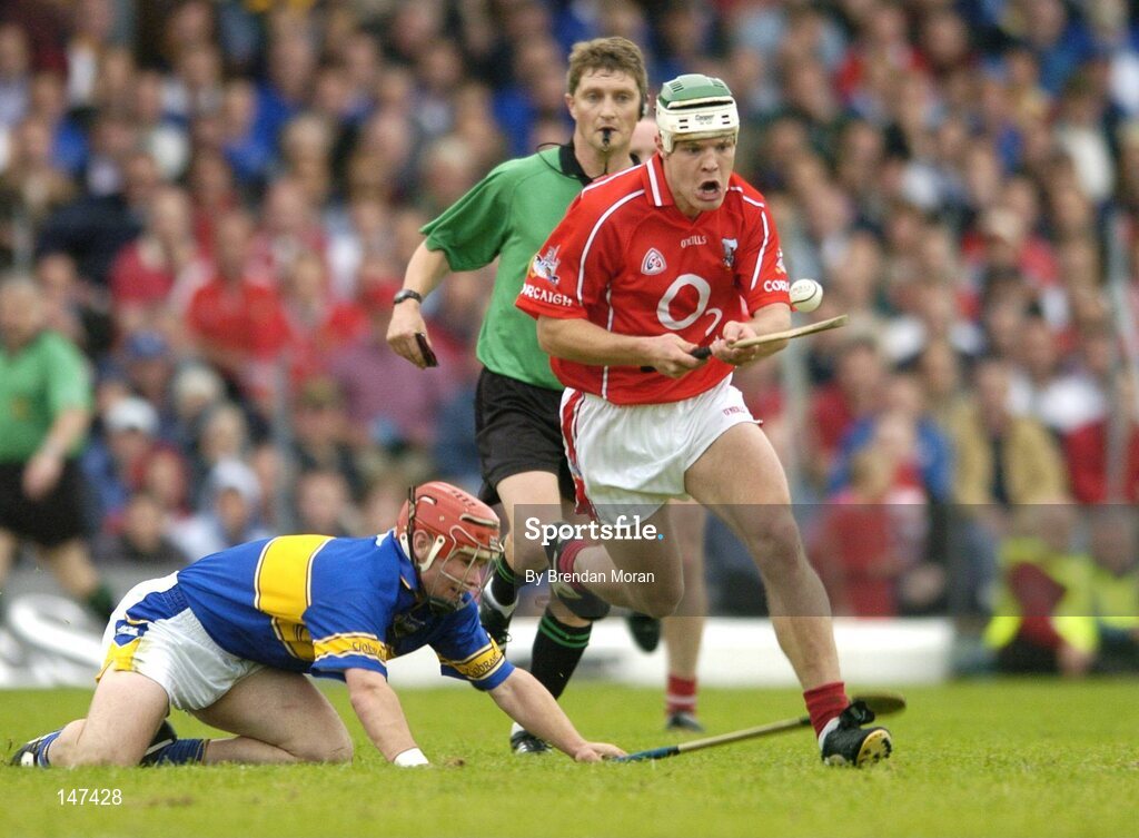 10 July 2004; Niall McCarthy, Cork, in action against Diarmuid Fitzgerald, Tipperary. Guinness Senior Hurling Championship Qualifier, Round 3, Cork v Tipperary, Fitzgerald Stadium, Killarney, Co. Kerry. Picture credit; Brendan Moran / SPORTSFILE